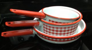3 Vintage Enamelware White With Red Trim And Checked Pots With Red Handles