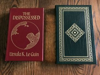 Easton Press Lest Darkness Fall By De Camp,  The Dispossessed By Ursula K Le Guin