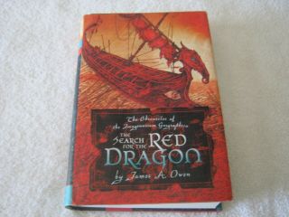 Signed By James A.  Owen - The Search For The Red Dragon: Geographica - Hb Dj 1st