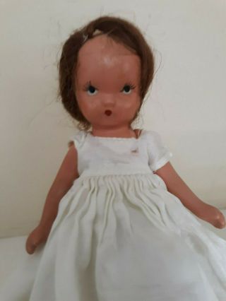 Vintage Story Book Bisque Doll Brunette Hair,  Movable Arms,  Silk Dress On Stand