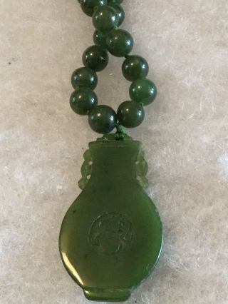 VINTAGE GREEN CHINESE JADE BEADED NECKLACE WITH CARVED JADE AND SYMBOLS 2
