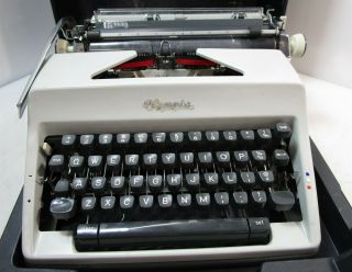Vintage Olympia DeLuxe Portable Typewriter W/Case 2