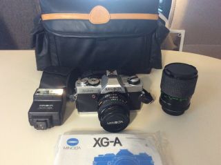 Vintage Minolta Xg - A 35mm Flim Camera With 2 Lenses 118x Flash & Mohawk Bag