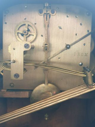 large vintage german d.  r.  g.  m.  wooden chiming mantel clock with key & pendulum. 7