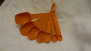 Set Of 7 Tupperware Vintage Orange Nesting Measuring Spoons & Ring Holder