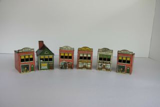 (6) Antique Tin Town Buildings - Fire Station,  House,  Toy Store,  Post Office,