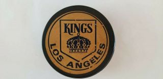 Vintage Los Angeles Kings Art Ross Tyer Converse Hockey Puck.