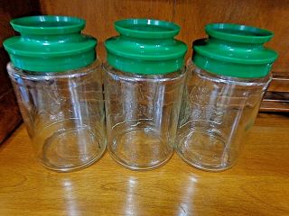 3 VINTAGE Anchor Hocking Glass Jars Seasons Spring Summer Winter w/ Green Lids 5