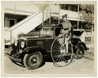 Gwen Lee On Penny - Farthing Bicycle With 1929 Chevrolet Coupe Vintage Photograph