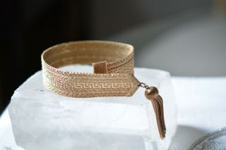 Vintage Costume Jewelry Gold Tone Mesh Greek Key Design Bracelet With Tassel