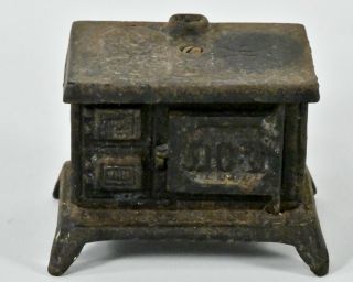 Vintage Miniature Cast Iron Oven Coin Bank " Cook With Cash "