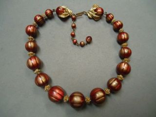 Vintage Trifari Rare Red Gold Lucite Swirl Bead Graduated Necklace Fancy Clasp