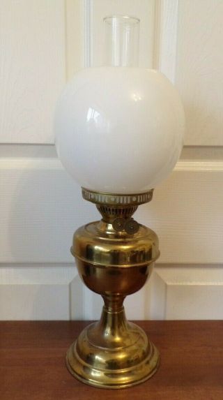 A Vintage Brass Oil Lamp With White Shade Duplex Twin Burner Order