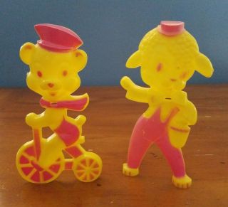 2 Vintage Standing Hard Plastic Sucker Holders Lamb And Bear On Tricycle