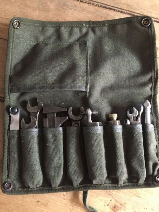 Vintage Bike Toolkit In Old Canvas Tool Roll