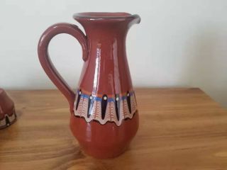 Vintage clay pottery pitcher with 6 matching cups 6