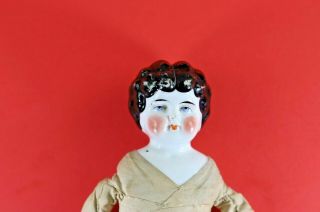 Antique China Head Doll with Molded Black Hair and Blue Eyes on Cloth Body 3