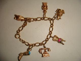 vintage Gold Tone Signed Avon Charm Bracelet With six Charms 2
