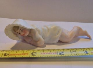 Antique German Bisque Tiny Piano Baby Laying Down Figurine Sun Bonnet 3.  75 In