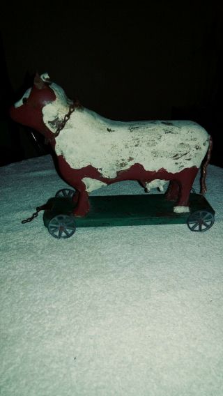 Antique Vintage Wood Cow Pull Toy With Old Paint Platform And Wheels