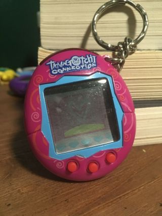 Bandai Tamagotchi Connection V1 2004 Magenta Pink Swirls Virtual Pet Vintage