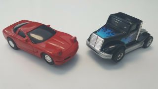 Vintage Artin Set Of Two 1/34 Scale Slot Cars,  1987 Corvette And Semi Truck Cab
