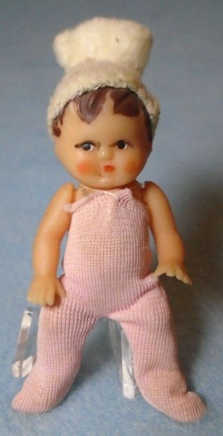Vintage 2 3/4 " Miniature Jointed Soft Rubber Baby Doll In A Pink One Piece Suit