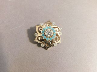 Vintage Gold Tone Blue And Clear Rhinestone Flower Swirl Pin Brooch
