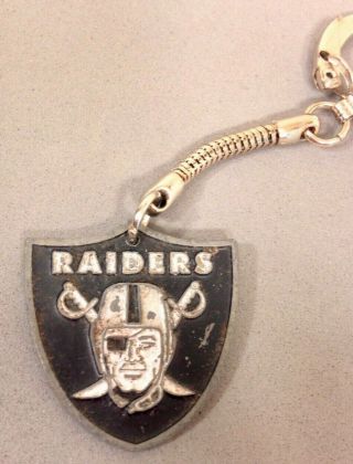 Vintage Oakland Raiders NFL Football Helmet Rawlings M & vintage key chain fob 7