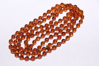 Vintage Long Strand Knotted Round Orange Amber Glass Bead Necklace