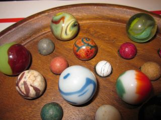 ANTIQUE/VINTAGE MARBLES WITH A BLACK WALNUT GAME BOARD IN 4