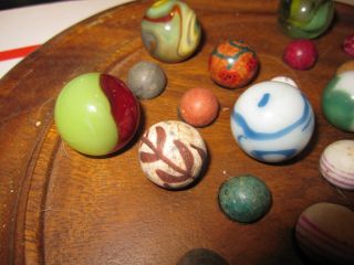 ANTIQUE/VINTAGE MARBLES WITH A BLACK WALNUT GAME BOARD IN 5