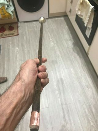vintage bamboo wooden walking stick is handle metal.  34 