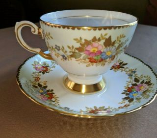 Vintage Tuscan English Multi Floral And Gold Fine Bone China Tea Cup And Saucer