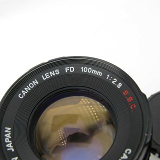 Vtg CANON 100mm F/2.  8 FD mount Camera lens Japan made 2