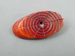 Vintage Mid Century Burnt Orange Carved Spider Web Bakelite Brooch Pin