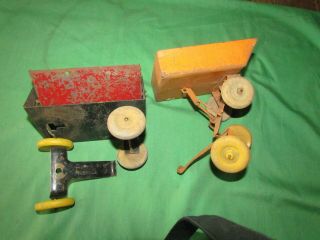 2 Vintage Metal Dump Trailers - Wooden Wheels - About 8 Inches Long