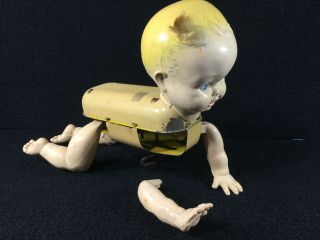 VINTAGE CELLULOID & TIN MECHANICAL CRAWLING BABY WIND UP TOY.  DETACHED ARM 2