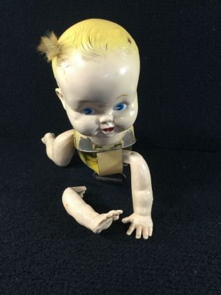 VINTAGE CELLULOID & TIN MECHANICAL CRAWLING BABY WIND UP TOY.  DETACHED ARM 3