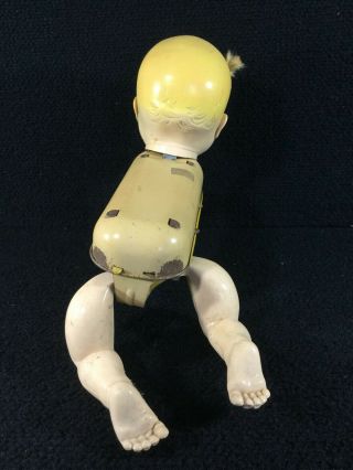 VINTAGE CELLULOID & TIN MECHANICAL CRAWLING BABY WIND UP TOY.  DETACHED ARM 6