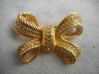 Vintage Christian Dior Gold Plated & White Crystal Tied Bow Pin