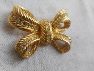 Vintage Christian Dior gold plated & white crystal tied bow pin 2