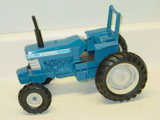 Vintage Ertl Ford Tractor 7710,  Cast Farm Toy,  U.  S.  A.