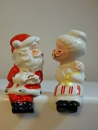 Vintage Santa Claus Mrs Christmas Salt & Pepper Shakers Kiss Bench Shelf Sitter