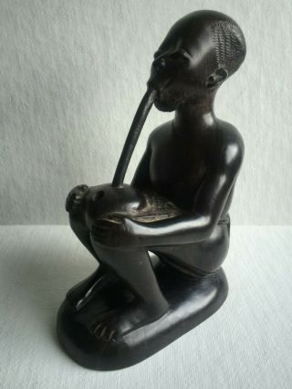 Vintage African Ebony Wood Hand Carved Statue Smoking A Pipe
