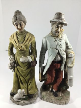 Vintage Figurine Set.  Woman With Puppy And Man With Hat & Ladder Apprx 11.  5 "