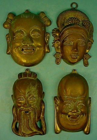Four Small Vintage Chinese Brass Or Bronze Face Masks