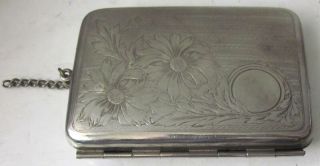 Vintage Silver Metal Compact With A Floral Motif And Token Holders