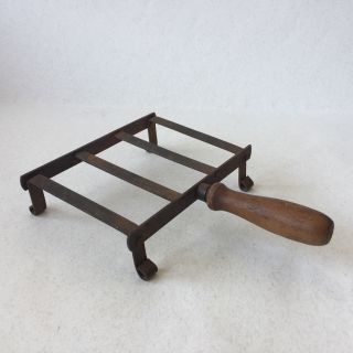 Vintage Primitive Cast Iron Stand With Wooden Handle
