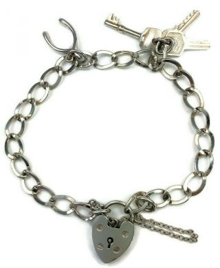 Vintage 925 Sterling Silver Charm Bracelet With 2 Charms.  Birmingham 1974